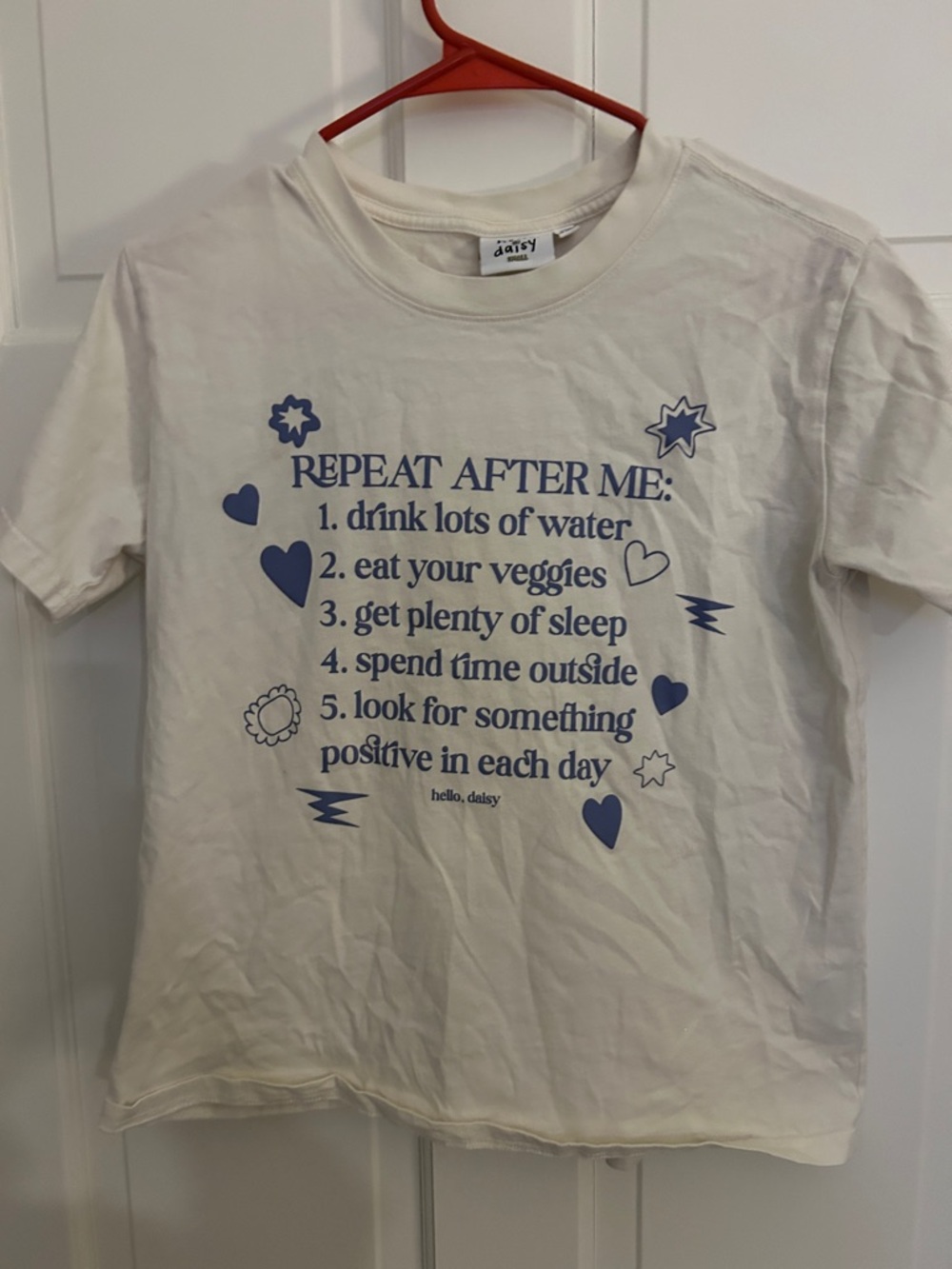 Daisy White Tee with Blue Positive List Graphic